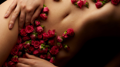 Symblobbild Yonimassage Rosen auf Bauch